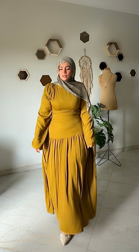 "كهرمان" dress