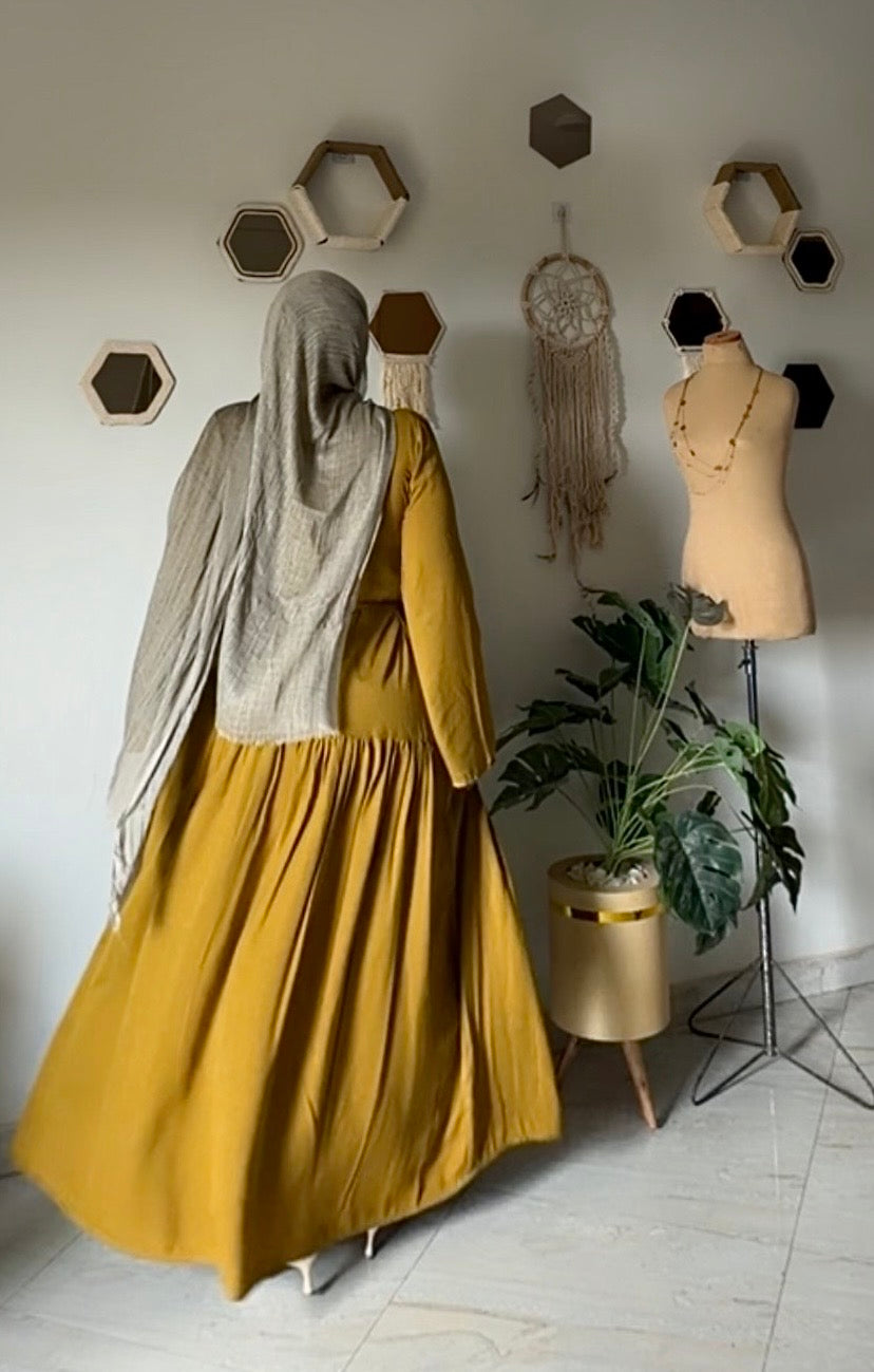 "كهرمان" dress